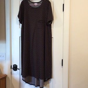 Carly dress black background with triangles